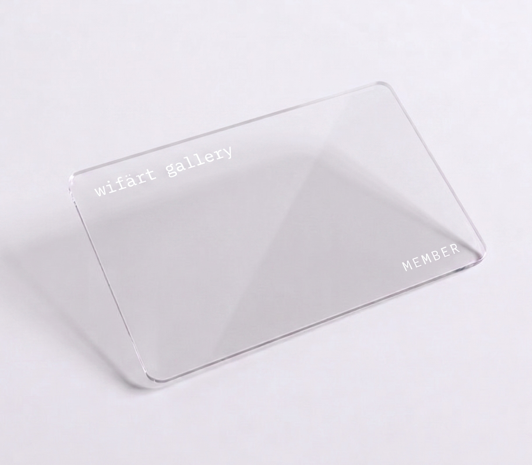 The wifärt gallery membership card - a clear card marked 'wifärt gallery' and 'MEMBER'.